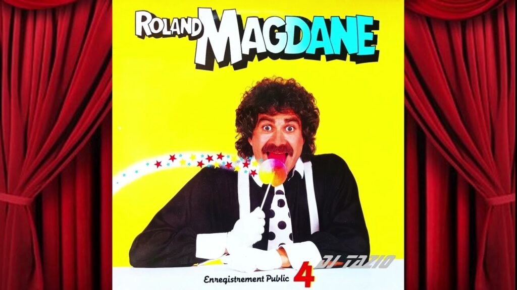 Roland Magdane sur scène dans une performance humoristique marquante